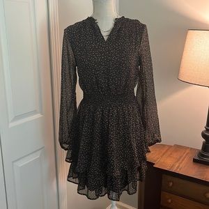 Beautiful dress black and brown fully lined,except sleeves.   Size medium